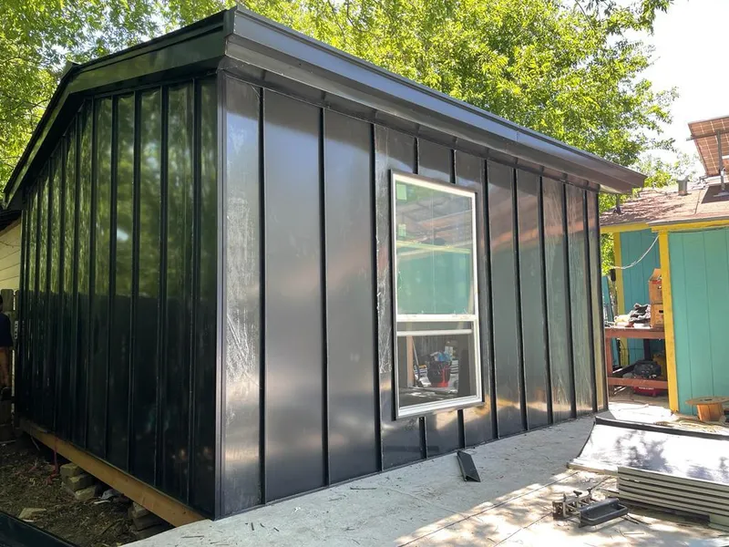 Black standing seam metal wall panels for Roof Inspection in Hoosick